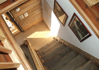 Stairway: The cottage is small but powerful. For decades, it served as a depository of valuable food.