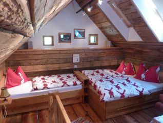 The bedroom on the first floor can accommodate up to five people. Also a cot can be placed there.